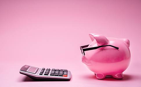 Piggy bank and calculator