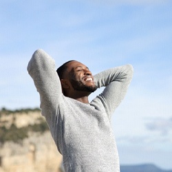 a man enjoying benefits of dental implants in Las Vegas