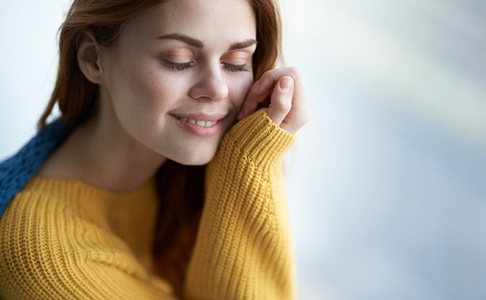 woman smiling before getting Invisalign in Las Vegas