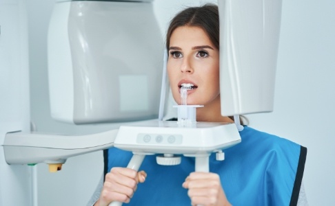 Woman receiving 3 D cone beam imaging scans